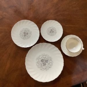 12 place settings of Lenox China